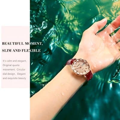 Luxury watch on a wrist with shimmering water background, emphasizing elegance and style, ideal for Monalisa Medical's branding and opt-related marketing.