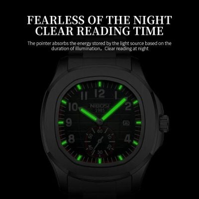 Luminous men's watch with green glow on dial, modern design, and durable stainless steel case for luxury watches collection.