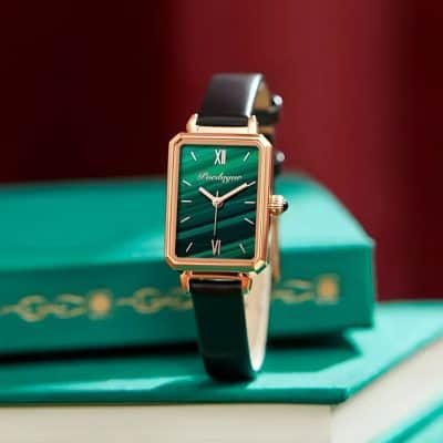 Elegant rectangular wristwatch with a green dial, gold-tone case, and black leather strap, showcasing luxury and style at Monalisa Store.