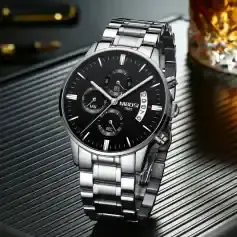 Stainless steel men's wristwatch with chronograph and date display, ideal for luxury and professional style.