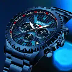 Luxury men's blue chronograph wristwatch with stainless steel band, detailed dial, and multiple sub-dials for precision timekeeping and date display.