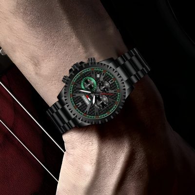 Stylish black men's wristwatch with chronograph functions shown on a person's wrist, perfect for fashion-forward accessories and luxury timepieces.