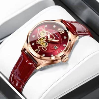 Luxurious red and gold wristwatch with intricate dial design, perfect for sophisticated fashion and timekeeping, from Monalisa Medical Store.