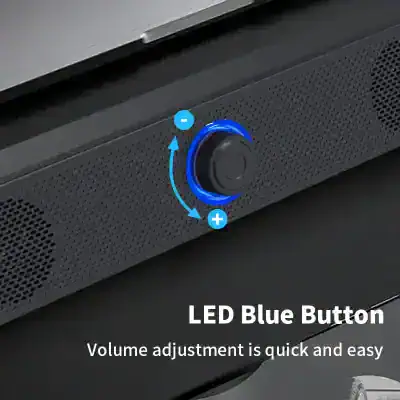 Light gray LED blue button for volume control on electronic device.