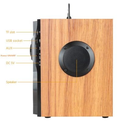 Wireless Bluetooth speaker with wooden finish, featuring USB port, AUX input, TF card slot, and high-quality sound for home or office use. Durable design with easy plug-and-play connectivity.