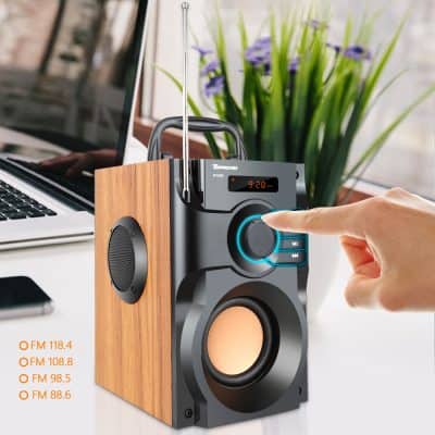 Portable wooden speaker with wireless connectivity, touchscreen controls, and radio functions for enhanced listening experience. Perfect for music lovers and tech enthusiasts.
