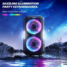 Colorful illuminated party speaker with RGB LED lights, set outdoors against a starry night sky reflecting on water, perfect for dance and karaoke entertainment.