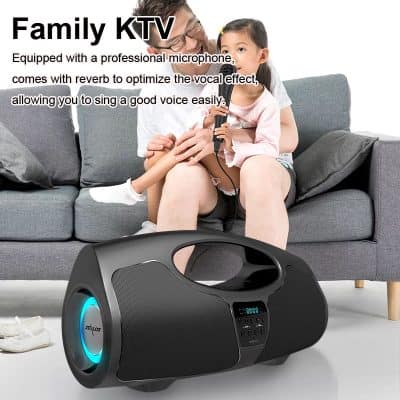 Portable karaoke machine with built-in microphone, LED display, and sound controls for family entertainment. Perfect for singing sessions, parties, and gatherings at home or outdoor events.