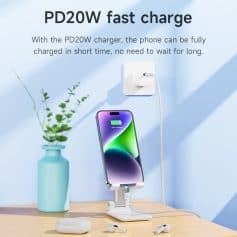Fast charging phone on PD20W charger with wireless charging station, AirPods, and earbuds at Monalisa Store.