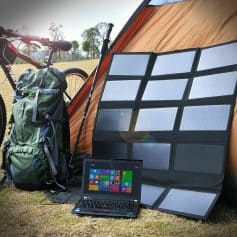 Portable solar panel and outdoor camping gear for eco-friendly off-grid energy solutions. Perfect for camping, hiking, and outdoor adventures with sustainable power options.