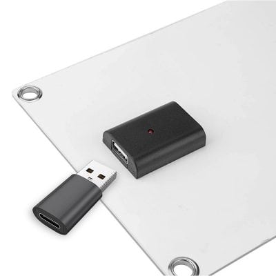 Small USB to HDMI converter, portable electronic accessory for connecting devices to external displays for enhanced visual experience.