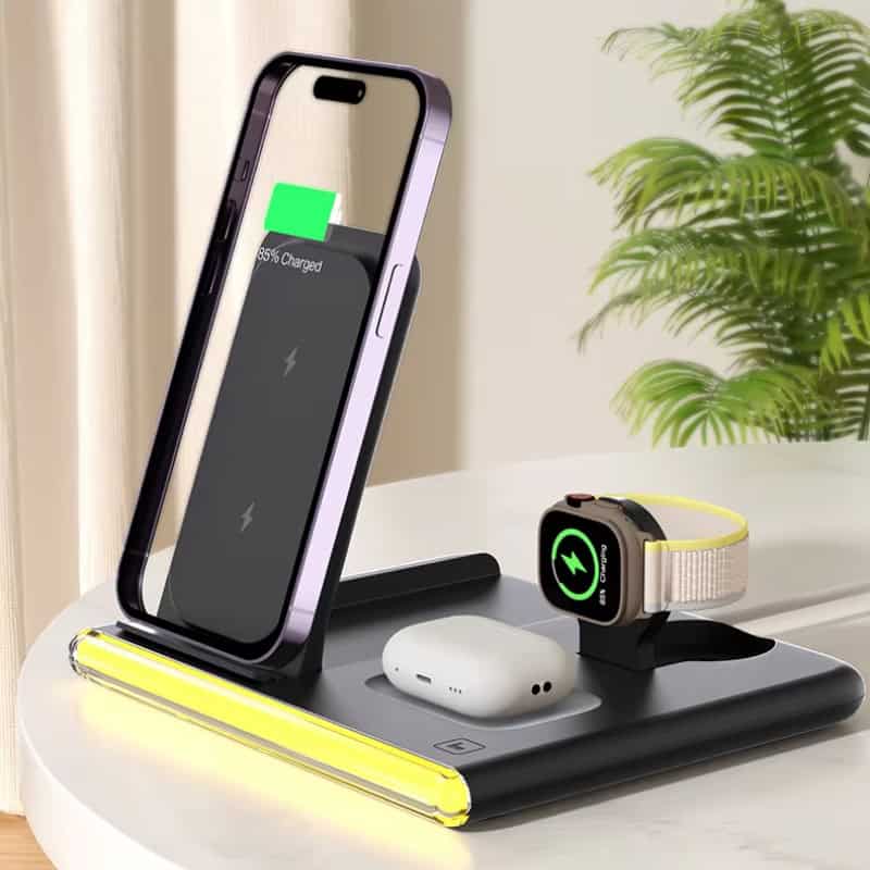 Wireless charging station with smartphone, smartwatch, and earbuds on a desk, featuring sleek design and LED lighting, ideal for tech-savvy users.