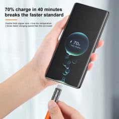 Fast wireless charging smartphone with 70% battery displayed, sleek black mobile device charging via cable, modern electronics, high-tech gadget, Monalisa Store product.