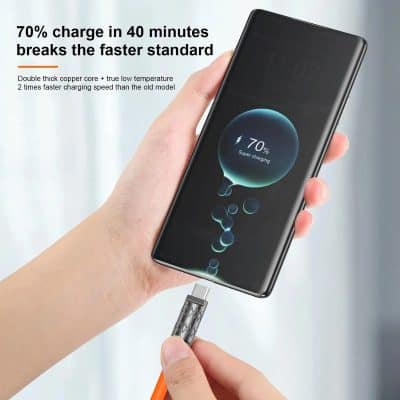 Fast wireless charging smartphone with 70% battery displayed, sleek black mobile device charging via cable, modern electronics, high-tech gadget, Monalisa Store product.