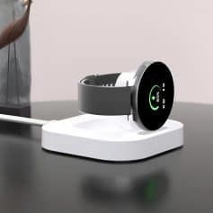 Realistic fitness tracker smartwatch charging on white dock, close-up of modern wearable device with digital display, health and wellness technology, Monalisa Medical Store, opt for advanced health monitoring gadgets.