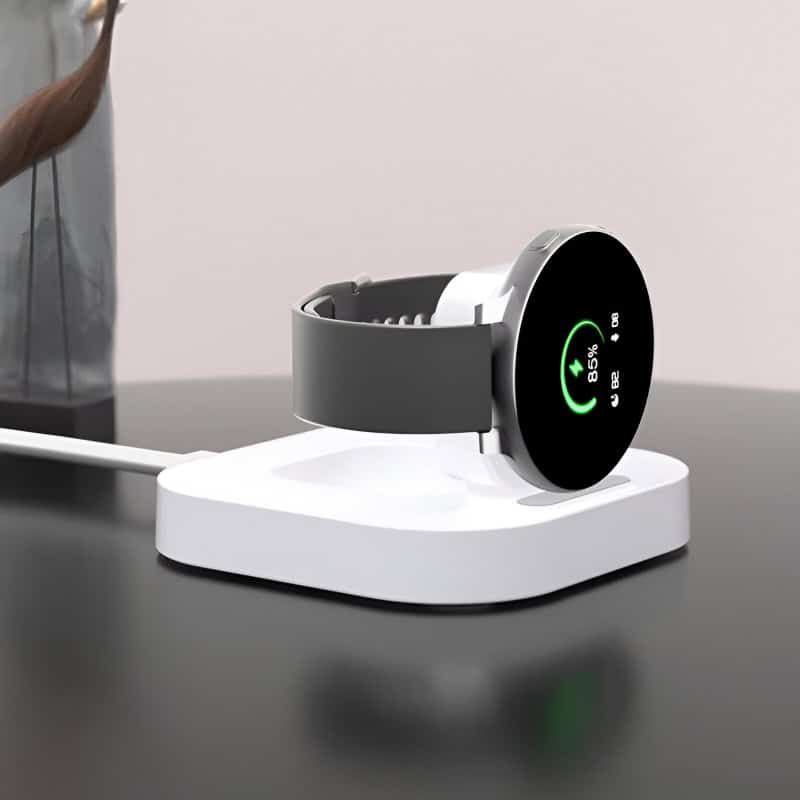 Realistic fitness tracker smartwatch charging on white dock, close-up of modern wearable device with digital display, health and wellness technology, Monalisa Medical Store, opt for advanced health monitoring gadgets.