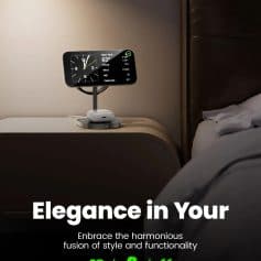 Wireless smart clock with weather, temperature, and air quality display on a bedside table, showcasing modern technology for home or hotel room decoration.