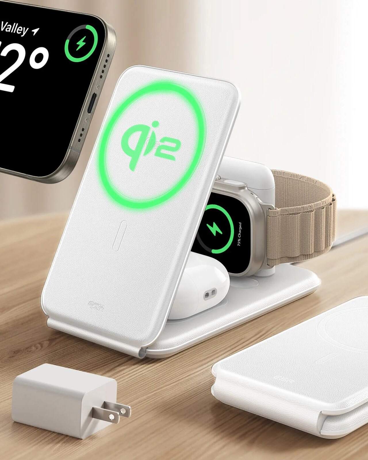 Wireless fast charging station with Qi2 technology for smartphones, smartwatches, and wireless earbuds, featuring LED indicator lights and sleek design.