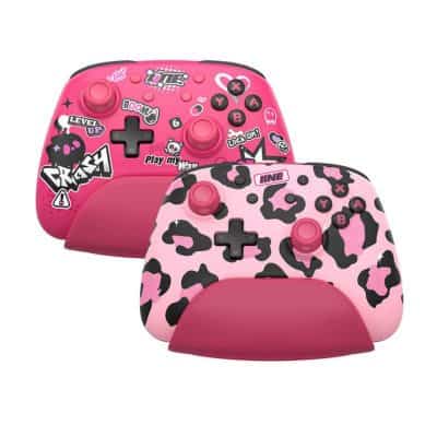 Colorful kids' gaming controllers with pink and black animal print designs, perfect for children who love gaming and playful accessories.