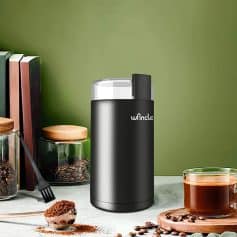 Portable coffee grinder and storage jar for fresh coffee beans at Monalisa Store - perfect for coffee enthusiasts and home brewing.
