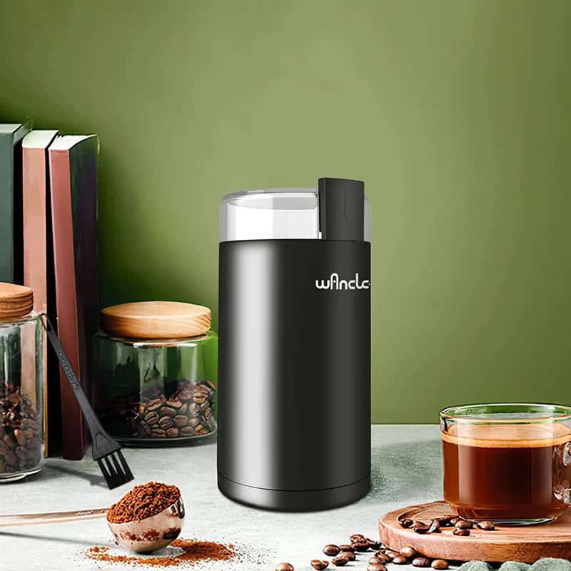 Portable coffee grinder and storage jar for fresh coffee beans at Monalisa Store - perfect for coffee enthusiasts and home brewing.