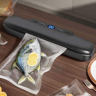 High-quality vacuum sealer machine for preserving fresh fish and seafood, featuring digital display and adjustable settings for optimal sealing.