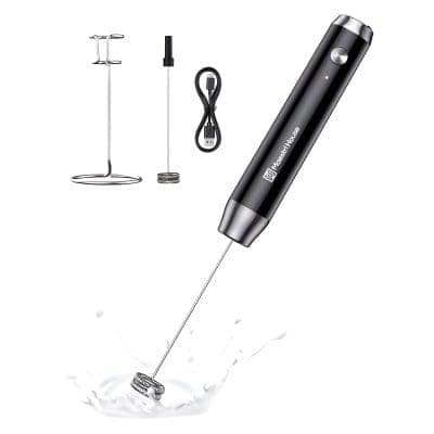 Stainless steel milk frother with handheld wand, USB charging cable, stand holder, and cleaning brush, perfect for making frothy coffee and latte art at home or cafe.