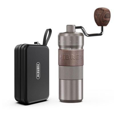 Portable coffee grinder with manual crank and carrying case, ideal for fresh coffee on the go at Monalisa Medical.