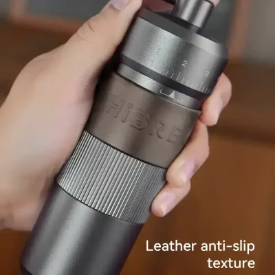 Stainless steel thermos with leather anti-slip texture for improved grip and comfort.