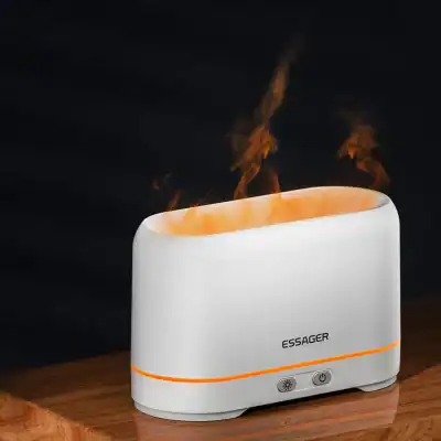 Vaporizer humidifier emitting warm mist, ideal for aromatherapy and air purification, compact design, perfect for home or wellness centers, from Monalisa Medical.