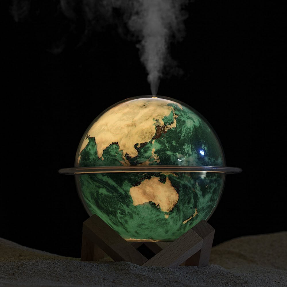 Illuminated Earth globe lamp on a wooden stand, environmentally themed decor, eco-friendly lighting, planet Earth night lamp, globe nightlight, sustainable home decor, world map light, global awareness lighting.