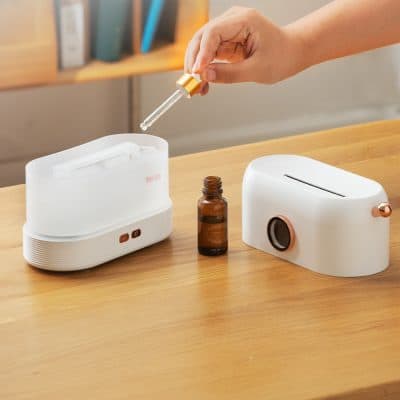 Dropper bottle with skincare serum for facial treatment.