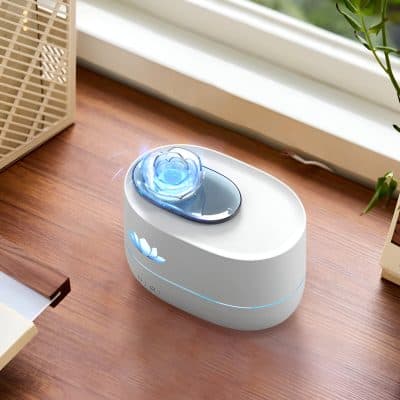 Ocular health device for eye care, advanced dry eye treatment, Monalisa Medical store optometry equipment, innovative ophthalmology tools, modern eye therapy device on wooden desk.