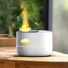 Air diffuser with steam and soft lotus flower glow, designed for aromatherapy and wellness. Perfect for home, spa, or meditation spaces, combining stress relief with aesthetic elegance.