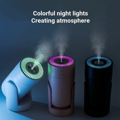 Colorful night light diffusers creating ambient atmosphere in dark room with illuminated ring lights and mist output, modern decorative air humidifiers, high-tech home ambiance accessories, Monalisa Store.