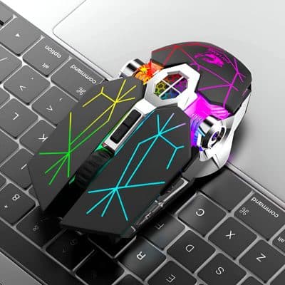 Colorful computer mouse with neon lights on a laptop keyboard, emphasizing modern tech accessories for gaming and professional use.