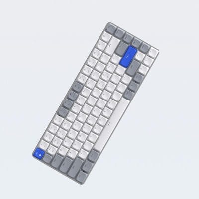 White and gray compact mechanical keyboard with blue Escape and Enter keys, ergonomic design, ideal for office and gaming setups.