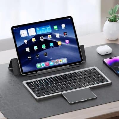 Modern iPad and wireless keyboard setup at Monalisa Store, showcasing premium tech accessories for optometry professionals and smart device enthusiasts.