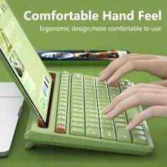 Keyboard with ergonomic design and pastel green color for comfortable typing and user-friendly experience.