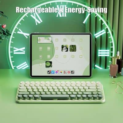 Rechargeable and energy-saving device on a green desk with a keyboard and digital screen, promoting eco-friendly tech solutions at Monalisa Store.