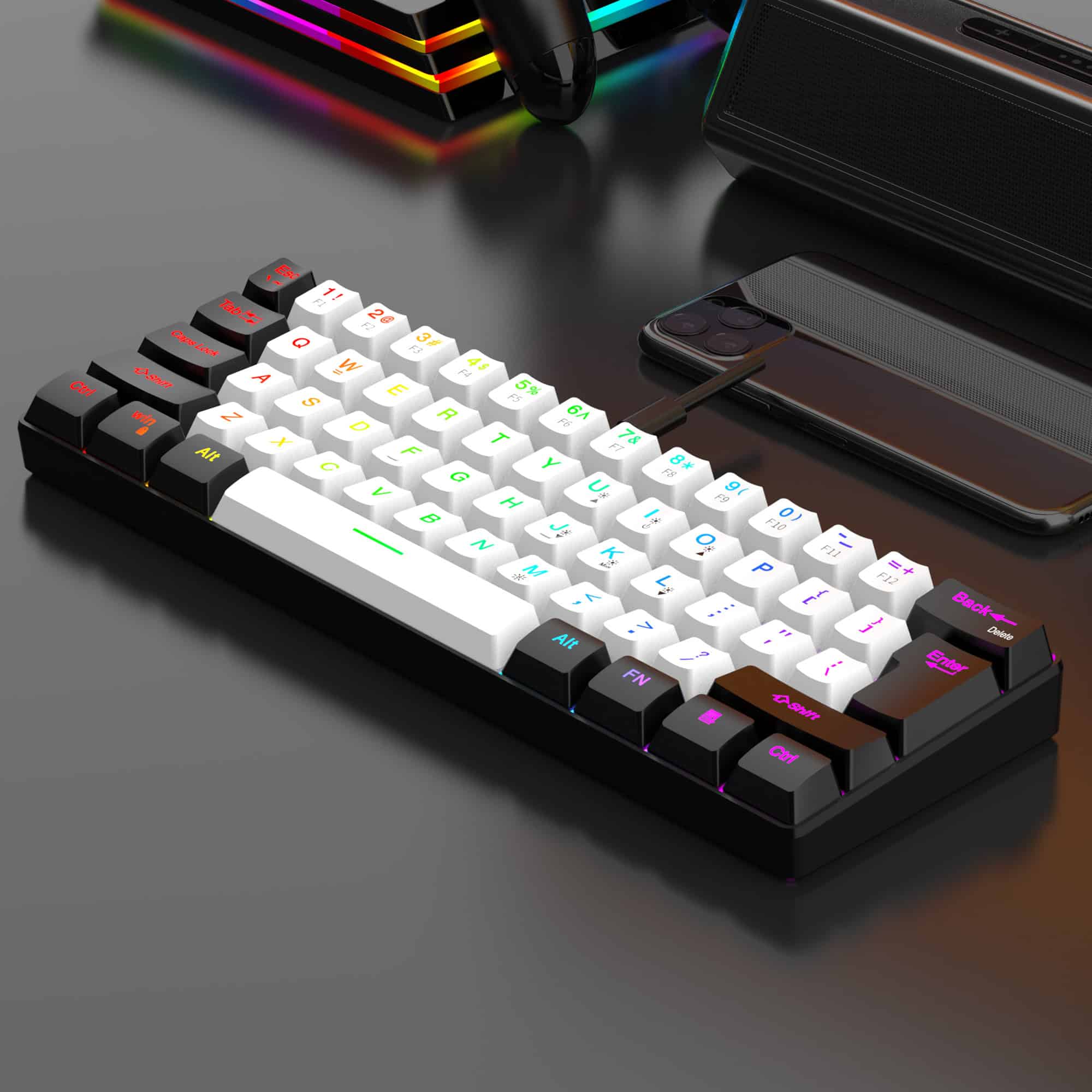 RGB backlit mechanical gaming keyboard with colorful keycaps on a sleek desk setup at Monalisa Store.