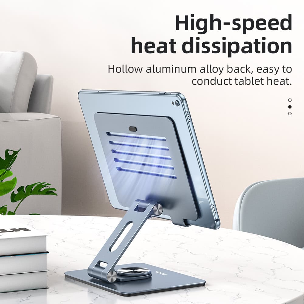 A sleek tablet with a high-speed heat dissipation stand, featuring a hollow aluminum alloy back for efficient conduction, on a modern white marble desk.