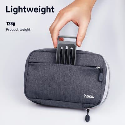Lightweight portable bag with a handle for easy carrying, featuring a compact design and durable construction for travel and everyday use.