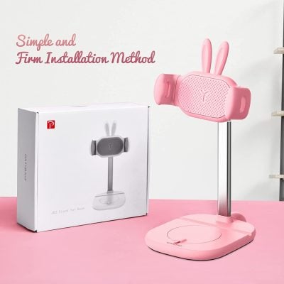 Wireless phone holder with bunny ear design, ideal for desk organization and phone display, featuring easy installation and cute aesthetic for office or home use.