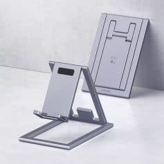 Sleek silver adjustable tablet stand with charging hole for iPad and tablets, modern design for workspace and home office.