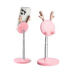 Reindeer phone holder, cute pink reindeer stand for smartphones, decorative desk accessory for home or office, Christmas gift idea, adorable reindeer design for Apple and Android devices, Monalisa Store.