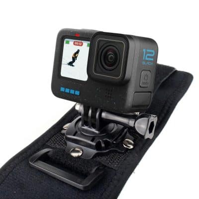 High-quality action camera mounted on a harness, ideal for sports and outdoor activities; durable, waterproof, perfect for capturing extreme sports or adventure footage.