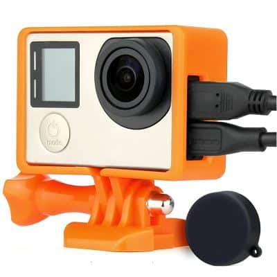 Portable action camera with waterproof housing, orange mount, and dual USB ports for outdoor sports and adventure filming. Perfect for high-quality, durable video recording.