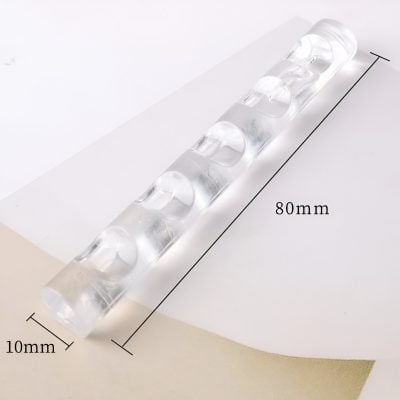 Thin clear silicone eyelash extension tray, 80mm length and 10mm width, used for eyelash extension application and beauty treatments.