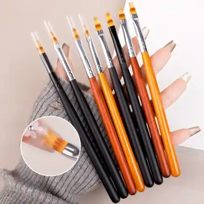 Colorful nail art brushes with wooden and black handles, perfect for professional manicures and nail design at Monalisa Store.